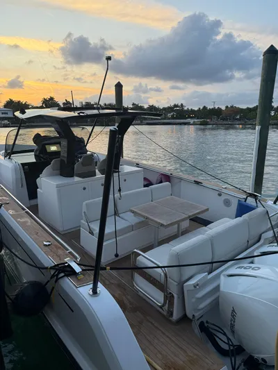  Yacht Photos Pics 2022 Pardo Yachts 38 docked at sunset, featuring sleek design and spacious seating.