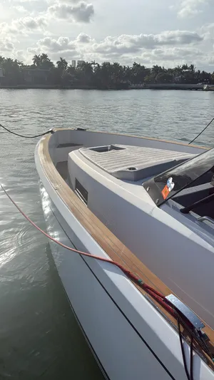  Yacht Photos Pics 2022 Pardo Yachts 38 on calm water, showcasing sleek design and wooden deck.