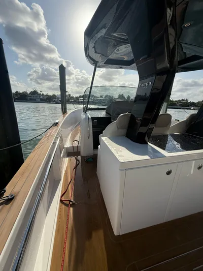  Yacht Photos Pics 2022 Pardo Yachts 38 docked, showcasing sleek design and modern features under a sunny sky.