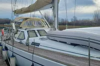 Sailing yacht Comar Comet 51 Dh 2002 docked, featuring sleek design and spacious deck.