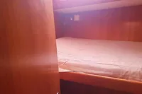 Cozy wooden cabin interior of 2002 Comar Comet 51 Dh yacht.