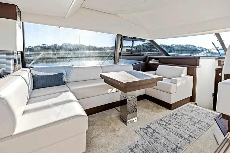  Yacht Photos Pics Luxurious interior of 2019 Prestige 520 yacht with elegant seating and modern design.