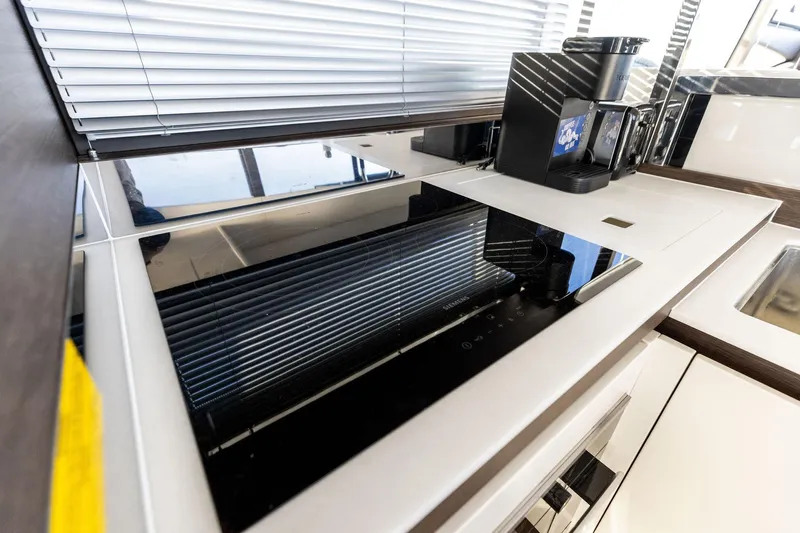  Yacht Photos Pics Modern kitchen in 2019 Prestige 520 yacht with sleek appliances and blinds.