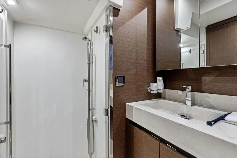  Yacht Photos Pics Luxurious bathroom in 2019 Prestige 520 yacht with modern fixtures and elegant design.