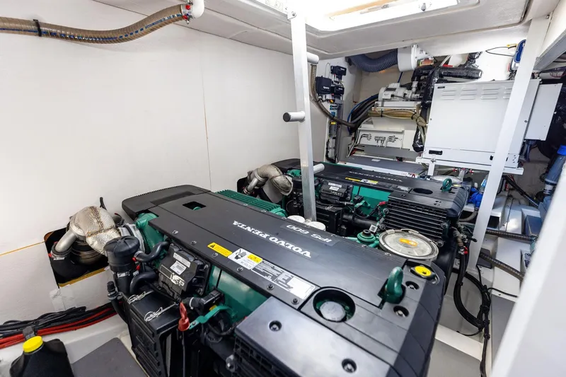  Yacht Photos Pics Engine room of a 2019 Prestige 520 yacht featuring Volvo Penta engines.