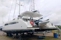 2023 Seawind 1600 Passagemaker catamaran on land, featuring sleek design and modern amenities.