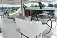2023 Seawind 1600 Passagemaker cockpit with dual steering wheels and modern navigation equipment.
