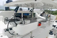 2023 Seawind 1600 Passagemaker yacht cockpit with dual steering wheels and navigation controls.