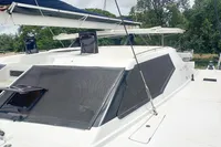 2023 Seawind 1600 Passagemaker yacht with sleek design and open hatches.