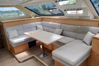 Luxurious interior of 2023 Seawind 1600 Passagemaker yacht with plush seating and modern design.