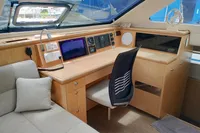 2023 Seawind 1600 Passagemaker interior with navigation station and modern amenities.