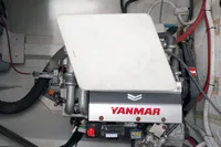 Engine compartment of 2023 Seawind 1600 Passagemaker with Yanmar engine.