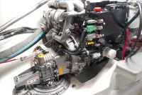 Engine compartment of 2023 Seawind 1600 Passagemaker, featuring Yanmar components and wiring.