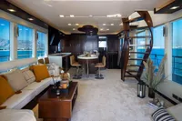 Luxurious interior of 2012 Bering 60 yacht with modern furnishings and ocean views.