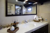 Luxurious bathroom interior on 2012 Bering 60 yacht with elegant decor and modern fixtures.