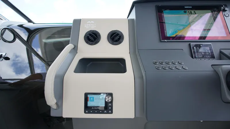 In-stock 2025 Nimbus W11 #60 Yacht Photos Pics Control panel of 2025 Nimbus Weekender 11 #60 with navigation display and controls.