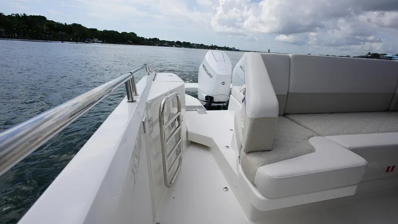 In-stock 2025 Nimbus W11 #60 Yacht Photos Pics Nimbus Weekender 11 #60, 2025 model, featuring sleek seating and modern design on open water.
