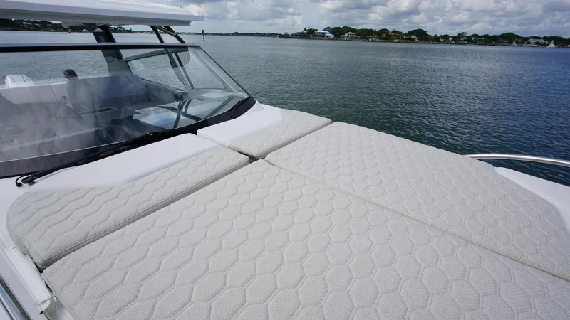 In-stock 2025 Nimbus W11 #60 Yacht Photos Pics Luxurious 2025 Nimbus Weekender 11 yacht with spacious sunbathing deck on calm waters.