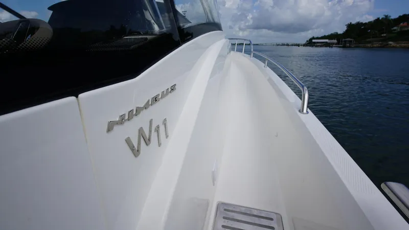 In-stock 2025 Nimbus W11 #60 Yacht Photos Pics Nimbus Weekender 11 #60, 2025 model, sleek design on calm waters.