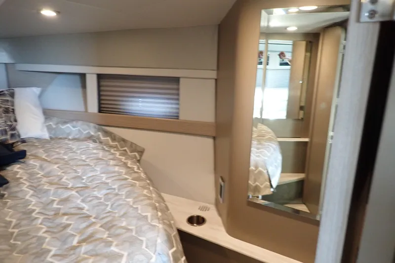  Yacht Photos Pics Interior of 2020 Formula 40 Performance Cruiser with bed and mirror.