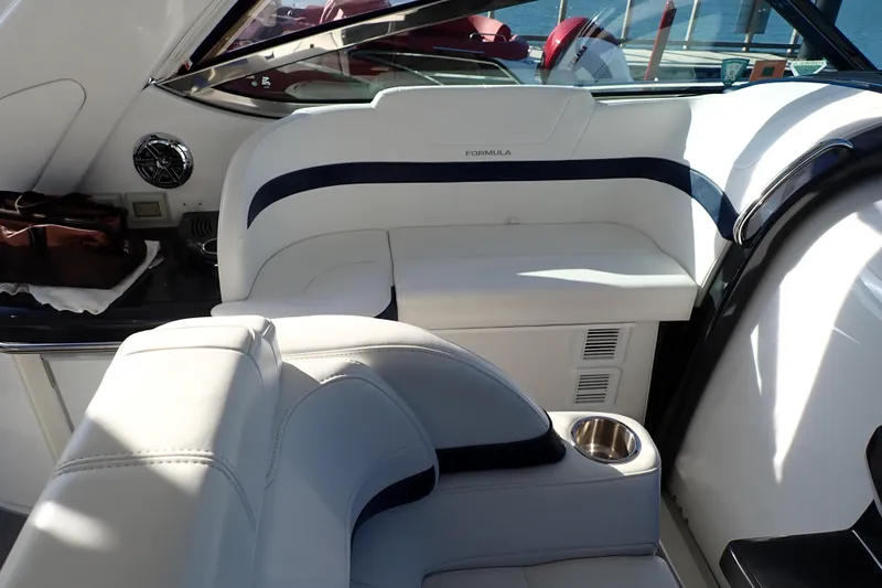  Yacht Photos Pics Interior of 2020 Formula 40 Performance Cruiser with white seating and cup holder.