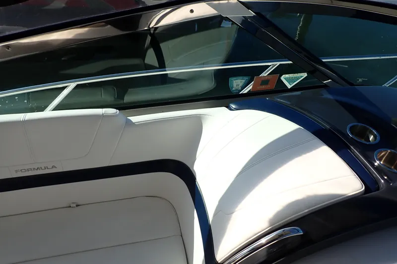  Yacht Photos Pics 2020 Formula 40 Performance Cruiser interior with white seating and cup holders.