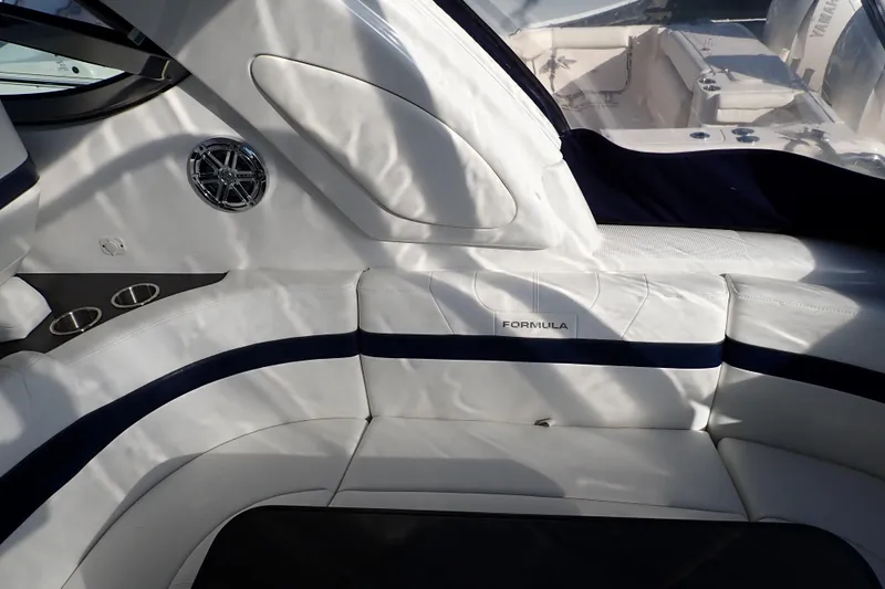  Yacht Photos Pics 2020 Formula 40 Performance Cruiser interior with white seating and cup holders.