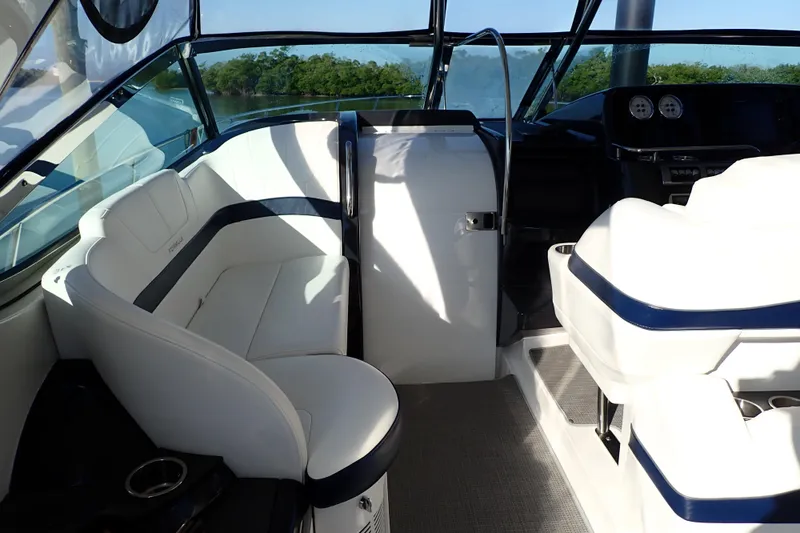  Yacht Photos Pics 2020 Formula 40 Performance Cruiser interior with white seating and modern dashboard.