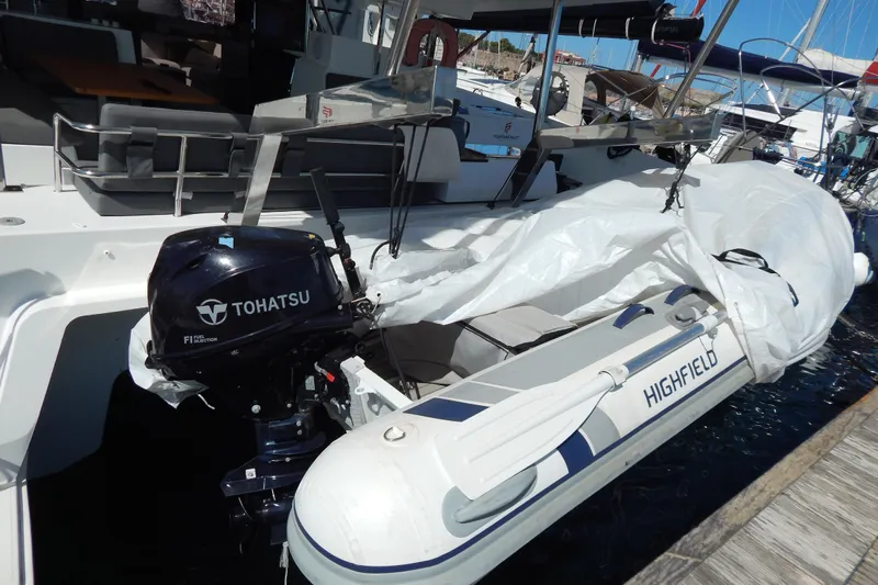  Yacht Photos Pics 2023 Fountaine Pajot Catamaran Elba 45 with Tohatsu motor and Highfield dinghy.