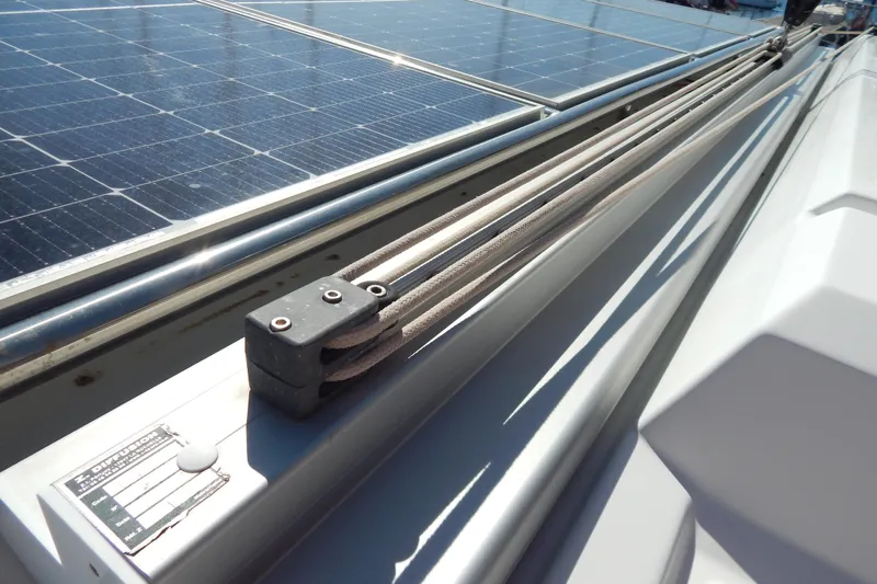  Yacht Photos Pics 2023 Fountaine Pajot Catamaran Elba 45 with solar panels and rigging details.