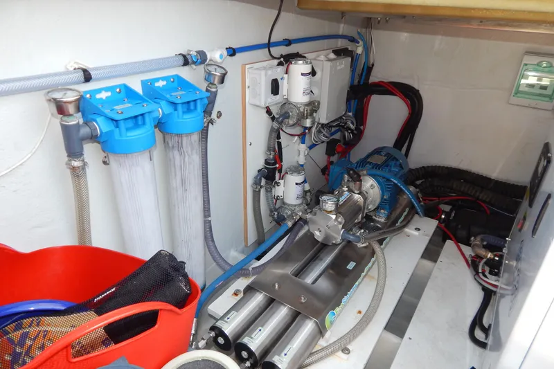 Yacht Photos Pics Engine room of 2023 Fountaine Pajot Catamaran Elba 45 with water filtration system.
