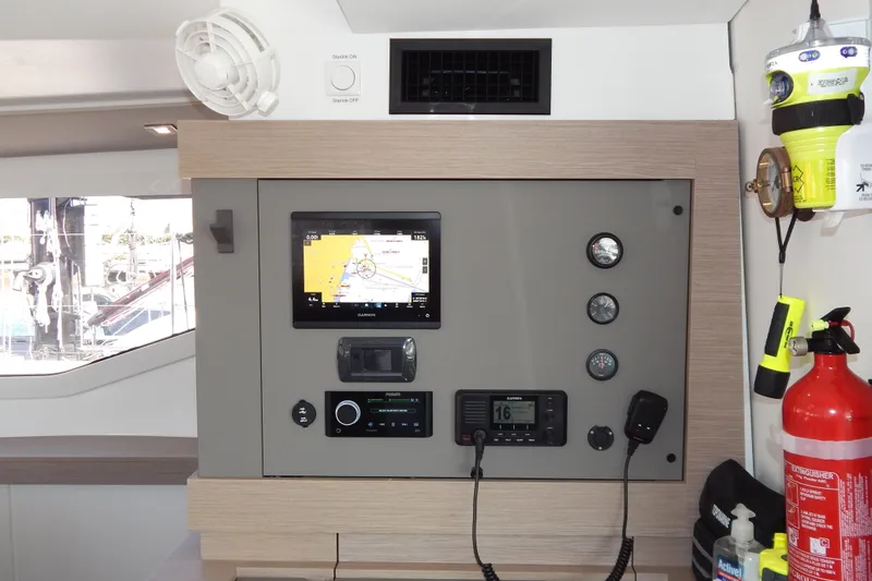  Yacht Photos Pics Control panel of 2023 Fountaine Pajot Catamaran Elba 45 with navigation and safety equipment.