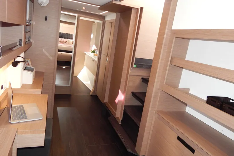  Yacht Photos Pics Interior of 2023 Fountaine Pajot Catamaran Elba 45, featuring modern wood finishes and sleek design.