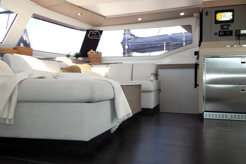  Yacht Photos Pics Luxurious interior of 2023 Fountaine Pajot Catamaran Elba 45 with modern furnishings.