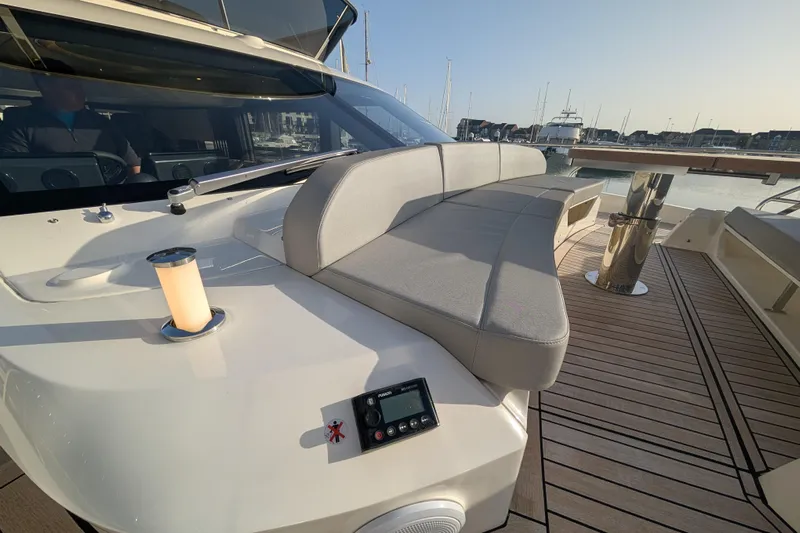  Yacht Photos Pics Luxurious 2025 Absolute 52 FLY yacht with elegant seating and modern design.