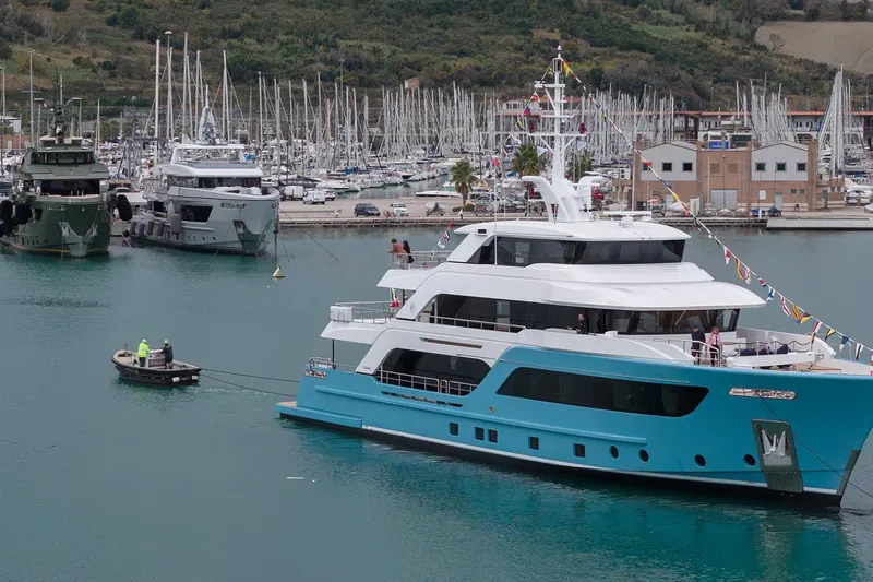 Presence Yacht Photos Pics Luxury yacht Cantiere Delle Marche Acciaio 130, 2026 model, docked in a marina.
