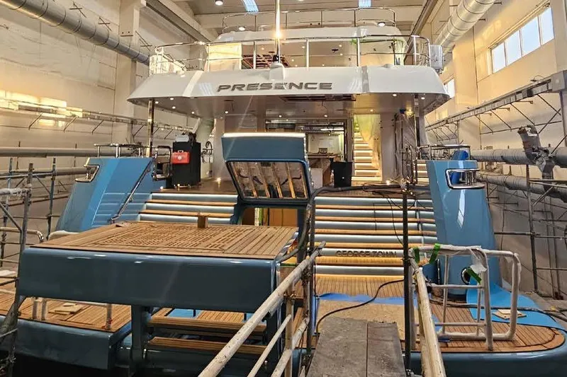 Presence Yacht Photos Pics 2026 Cantiere Delle Marche Acciaio 130 yacht under construction in a shipyard.