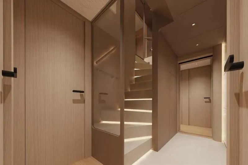 Presence Yacht Photos Pics Luxurious interior of 2026 Cantiere Delle Marche Acciaio 130 yacht with modern staircase design.