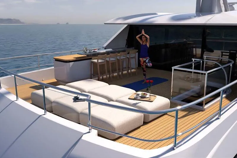 Presence Yacht Photos Pics Luxury yacht deck with yoga area, lounge seating, and ocean view, Cantiere Delle Marche Acciaio 130, 2026.