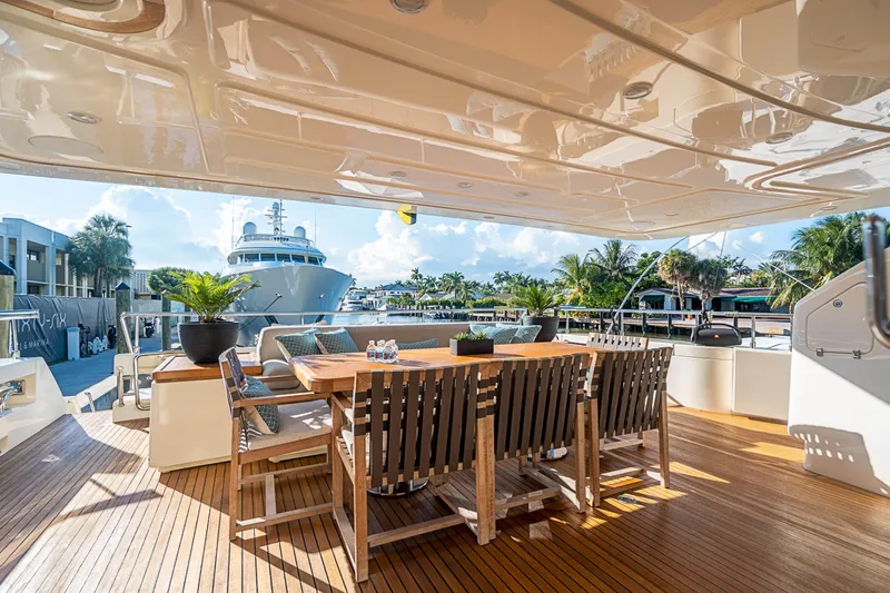 Patron Yacht Photos Pics Luxurious 2008 Ferretti Yachts Custom deck with elegant seating and scenic marina view.