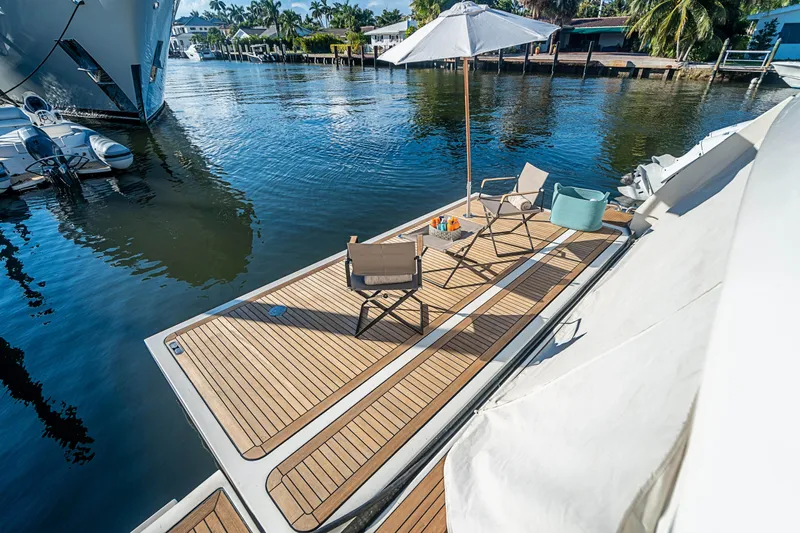 Patron Yacht Photos Pics Luxury yacht deck with chairs and umbrella, Ferretti Yachts Custom 2008 model.