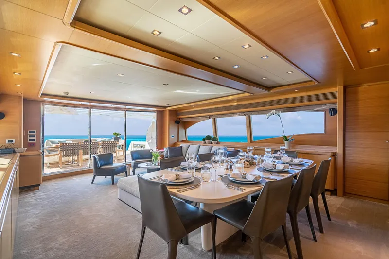 Patron Yacht Photos Pics Luxurious 2008 Ferretti Yachts Custom interior with elegant dining area and ocean views.