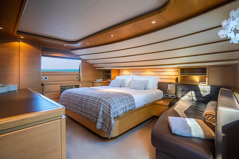 Patron Yacht Photos Pics Luxurious 2008 Ferretti Yachts Custom bedroom with elegant wood finish and modern design.