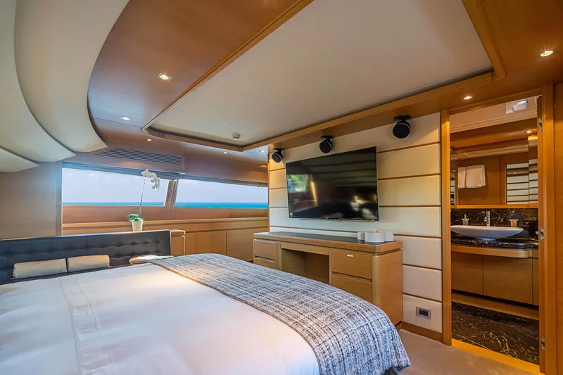Patron Yacht Photos Pics Luxurious 2008 Ferretti Yachts Custom bedroom with modern decor and ocean view.