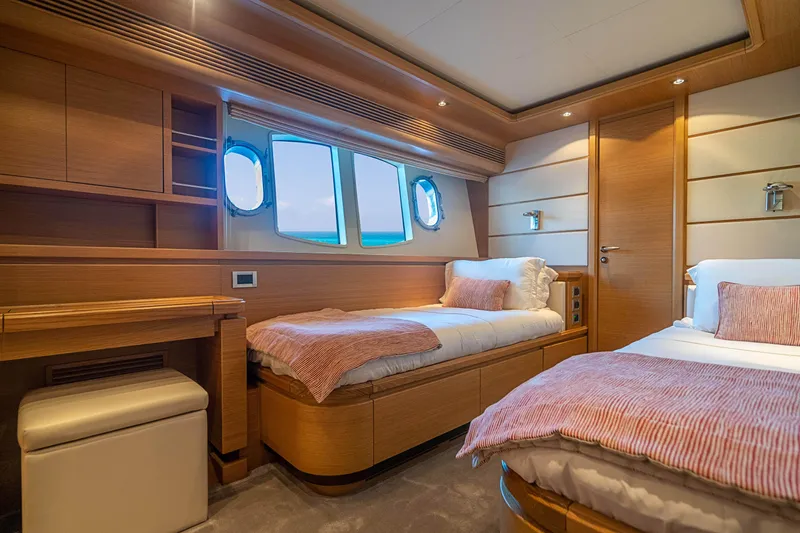 Patron Yacht Photos Pics Luxurious 2008 Ferretti Yachts Custom cabin with twin beds and elegant wood finish.