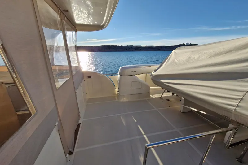 Mazu Yacht Photos Pics Spacious deck of 2011 Adagio 58 yacht with scenic ocean view.