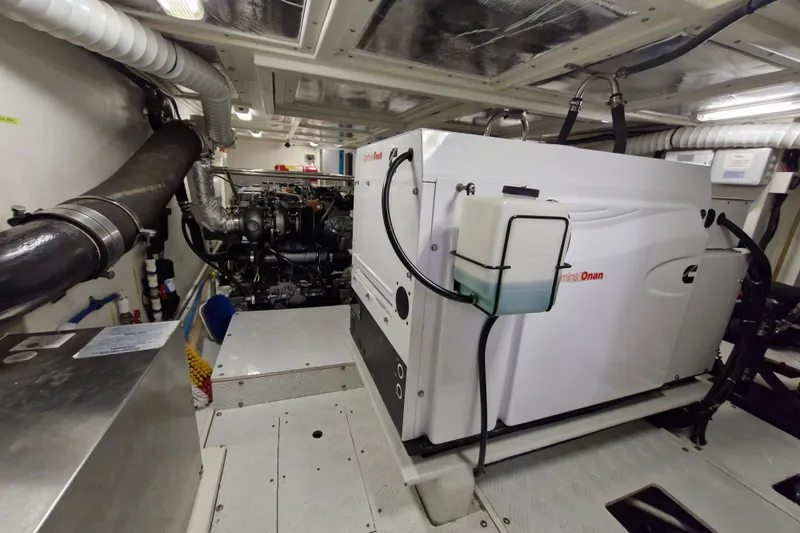 Mazu Yacht Photos Pics Engine room of a 2011 Adagio 58 yacht with Cummins Onan generator.