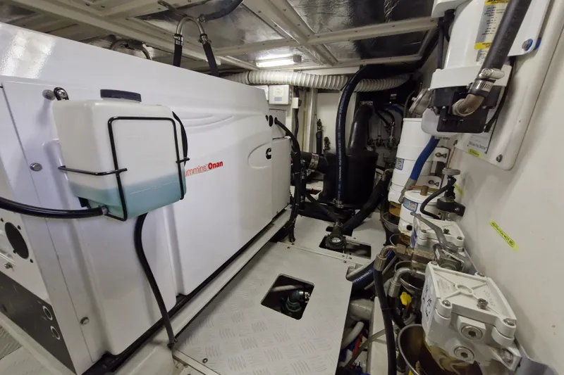 Mazu Yacht Photos Pics Engine room of 2011 Adagio 58 yacht with Cummins Onan generator.