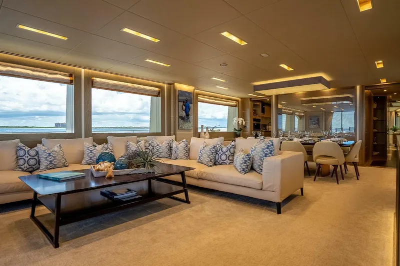 Short Story Yacht Photos Pics Luxurious interior of 2017 Horizon RP120 yacht with elegant seating and ocean view.