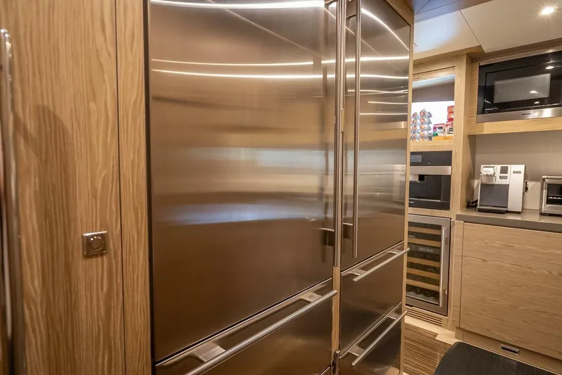 Short Story Yacht Photos Pics Modern kitchen with stainless steel appliances in a 2017 Horizon RP120 yacht.